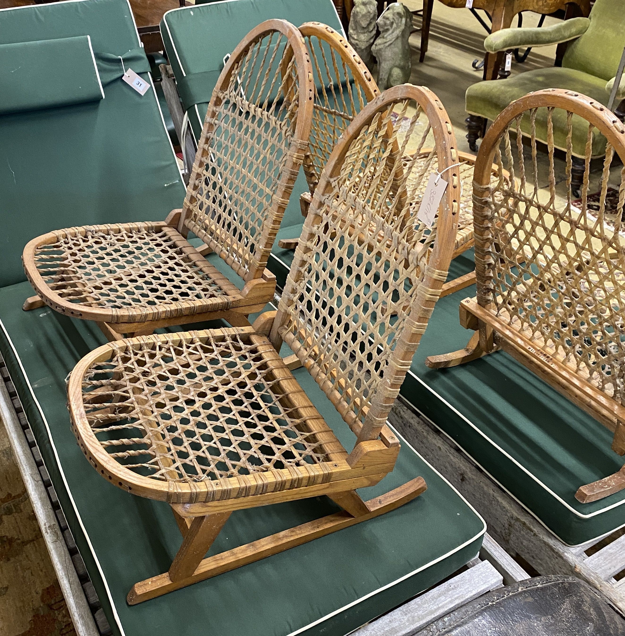 A set of four vintage American bentwood and animal gut folding canoe seats by Tubbs of Wallingford, width 40cm, depth 52cm, height 60cm